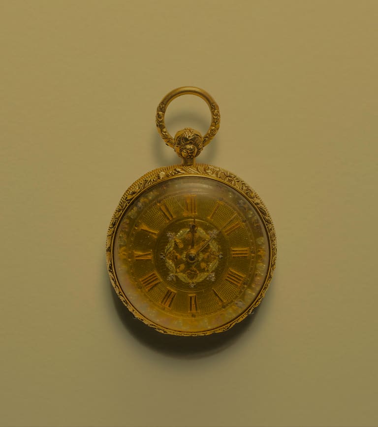 Antique engraved gold pocket watch